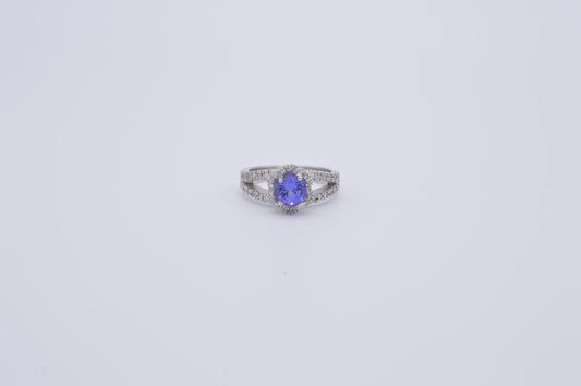 tanzanite round cut and diamond cluster ring