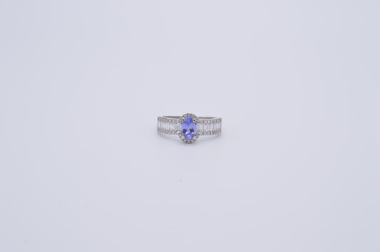 tanzanite oval cut and baguette diamond cluster ring